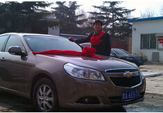 超前涂料獎勵員工轎車，真石漆生產(chǎn)廠家！